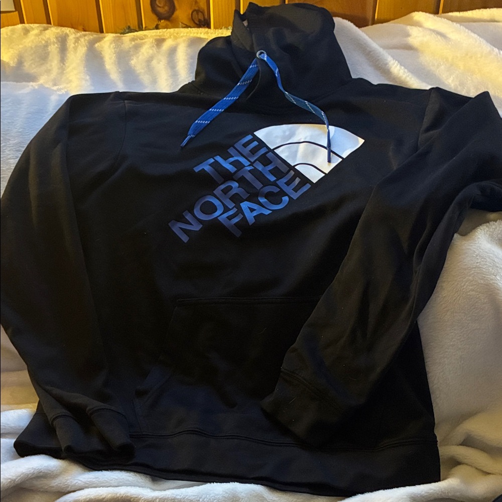 The North Face Black Turtleneck Hoodie with Blue and White Logo